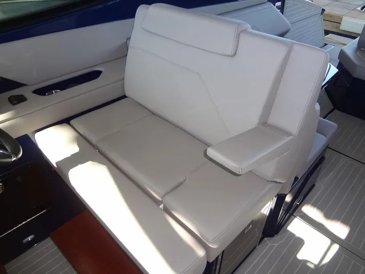  Yacht Photos Pics 2021 Cruisers Yachts 38 GLS I/O interior seating, featuring white upholstery and modern design.