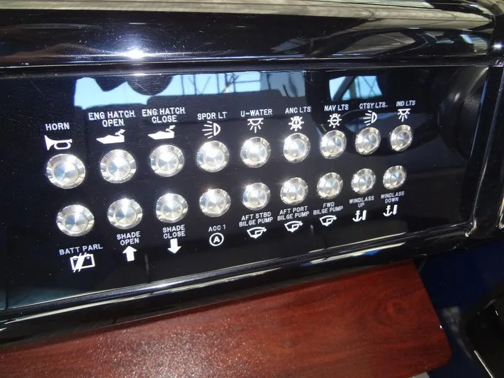 Yacht Photos Pics Control panel of 2021 Cruisers Yachts 38 GLS I/O with labeled buttons and switches.