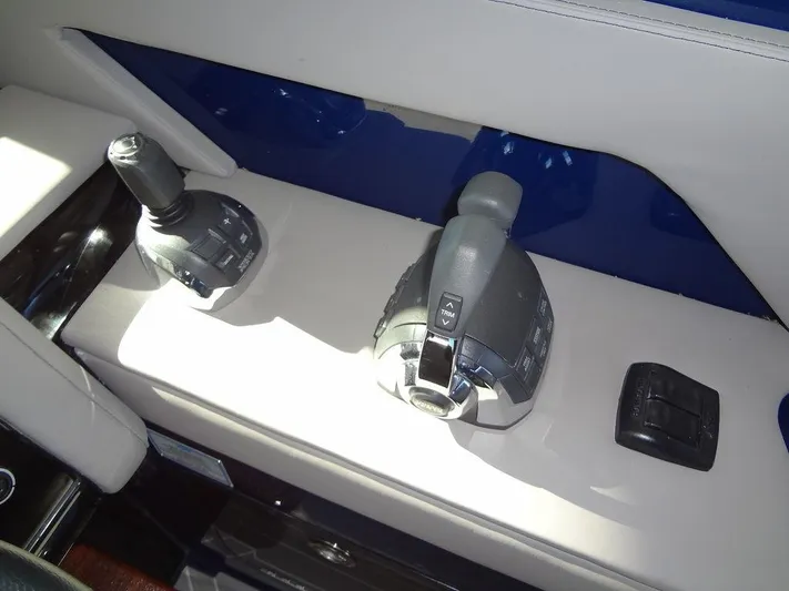  Yacht Photos Pics Control panel of 2021 Cruisers Yachts 38 GLS I/O with throttle and joystick.