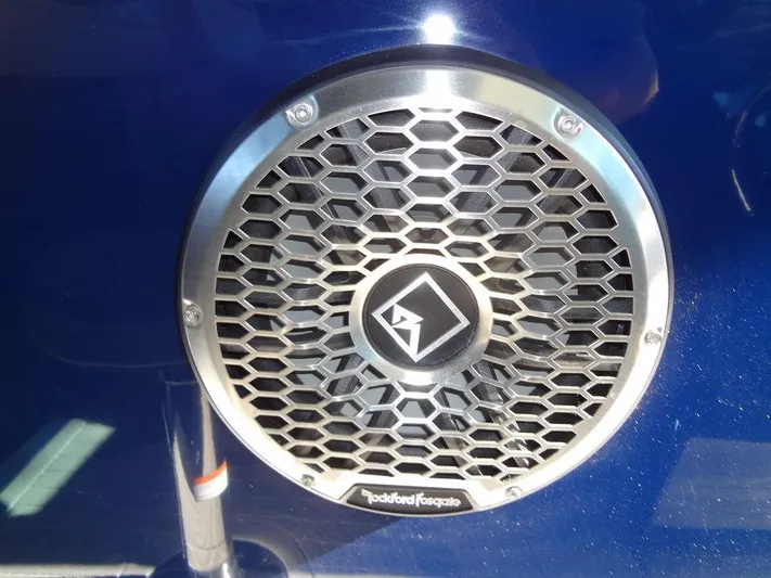  Yacht Photos Pics Rockford Fosgate speaker on 2021 Cruisers Yachts 38 GLS I/O, blue background.
