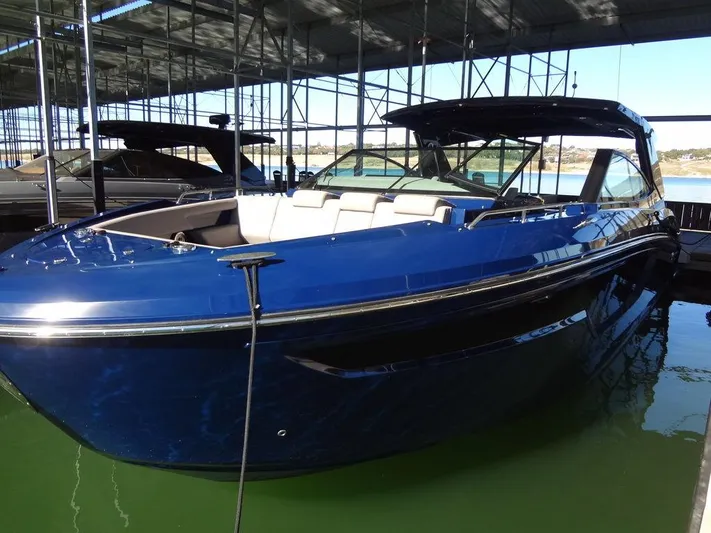  Yacht Photos Pics 2021 Cruisers Yachts 38 GLS I/O in marina, sleek blue design.