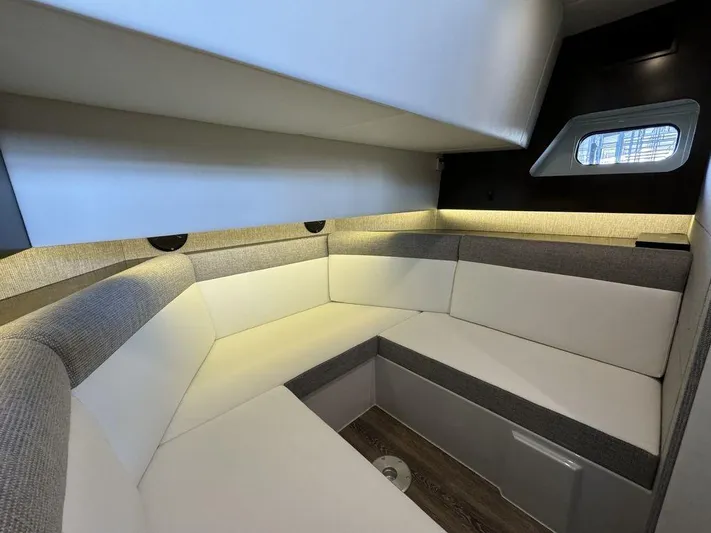  Yacht Photos Pics Interior of 2021 Cruisers Yachts 38 GLS I/O with modern seating and ambient lighting.