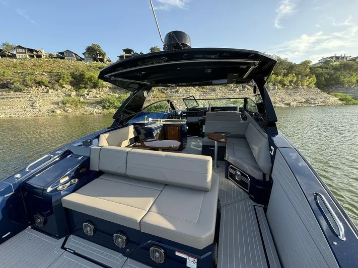  Yacht Photos Pics 2021 Cruisers Yachts 38 GLS I/O with spacious seating on a serene lake.