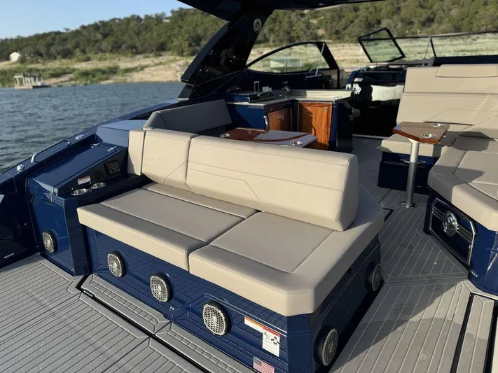  Yacht Photos Pics 2021 Cruisers Yachts 38 GLS I/O with luxurious seating and modern interior on a scenic lake.