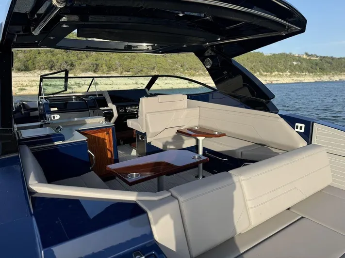  Yacht Photos Pics 2021 Cruisers Yachts 38 GLS I/O with luxurious seating and sleek design on the water.