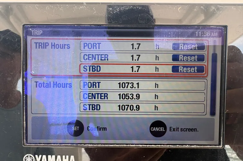  Yacht Photos Pics Display screen showing trip and total engine hours for Everglades 355 Center Console, 2015 model.