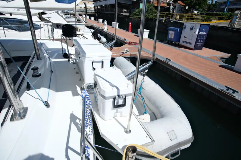 Sv Hypnautic Yacht Photos Pics Lagoon 440 catamaran docked, featuring deck equipment and inflatable dinghy, 2002 model.