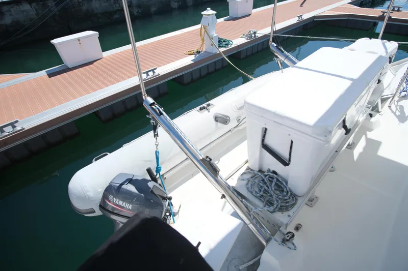 Sv Hypnautic Yacht Photos Pics 2002 Lagoon 440 yacht with Yamaha motor, docked at marina.