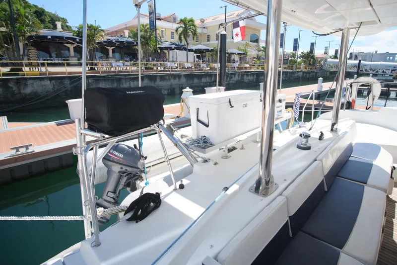 Sv Hypnautic Yacht Photos Pics Lagoon 440 catamaran docked at marina, featuring seating and equipment on deck.