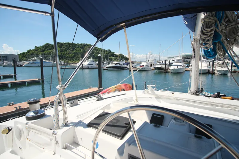 Sv Hypnautic Yacht Photos Pics Lagoon 440 catamaran from 2002 docked at a marina with clear blue skies.