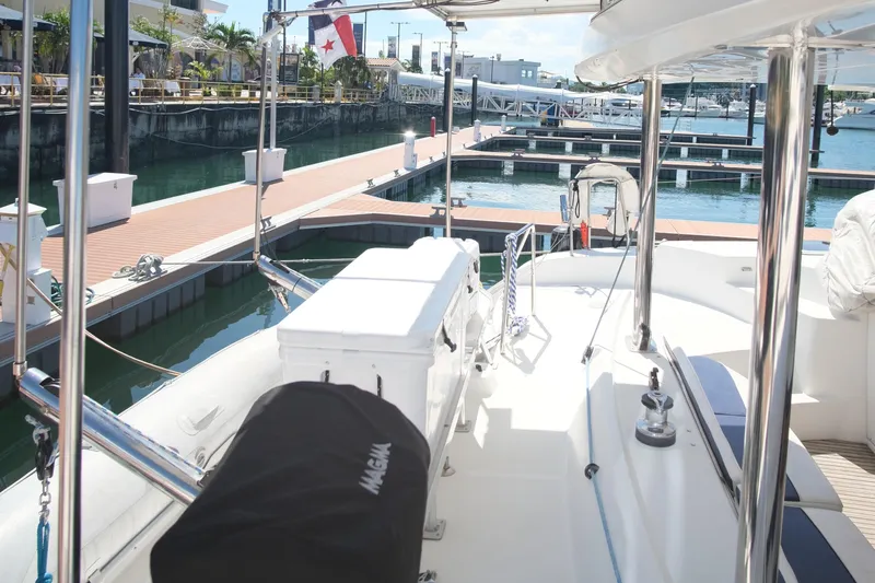 Sv Hypnautic Yacht Photos Pics Lagoon 440 catamaran docked at marina, showcasing spacious deck and seating area.