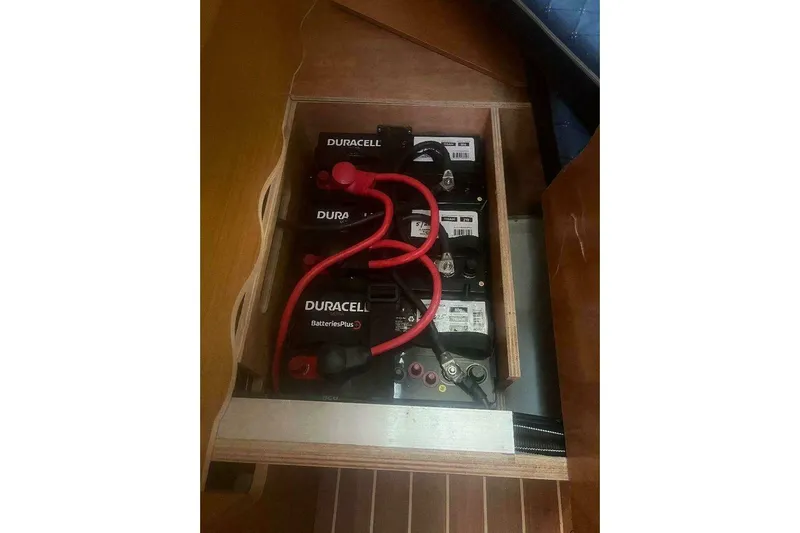 Phantom Yacht Photos Pics Battery compartment of a 2007 Jeanneau Sun Odyssey 39i sailboat with Duracell batteries.