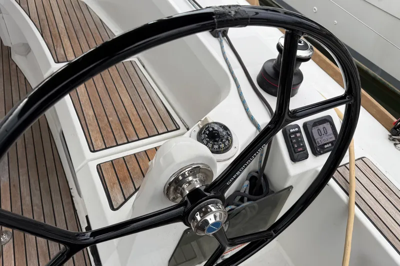 A Bientot Yacht Photos Pics Steering wheel and controls of 2016 Jeanneau Sun Odyssey 349 sailboat.