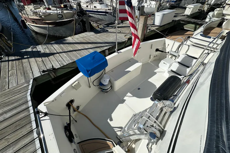  Yacht Photos Pics Novatec Islander 55 yacht, 2006 model, docked with American flag and deck equipment.