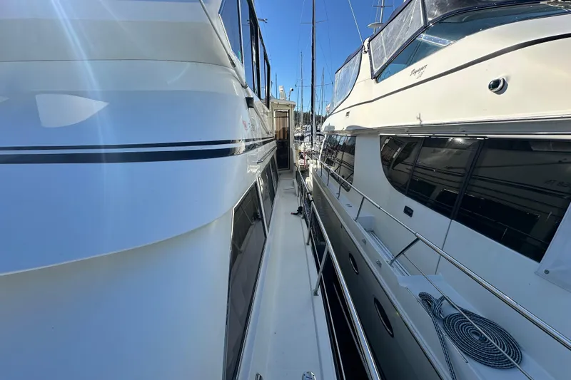  Yacht Photos Pics Two yachts docked side by side, featuring a 2006 Novatec Islander 55.