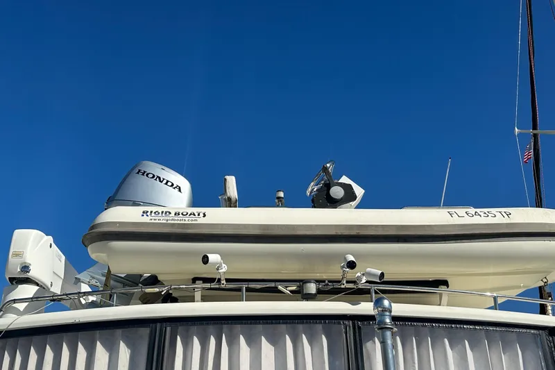  Yacht Photos Pics Novatec Islander 55 yacht with Rigid Boats tender and Honda motor, 2006 model.