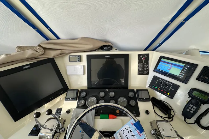  Yacht Photos Pics Cockpit of 2006 Novatec Islander 55 yacht with navigation and control panels.