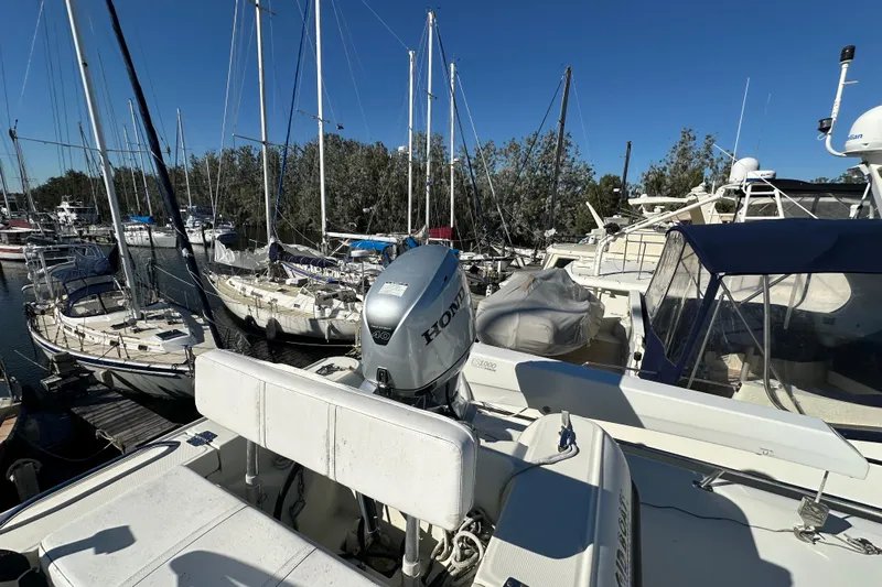  Yacht Photos Pics Novatec Islander 55 yacht, 2006 model, docked in a marina with other boats.