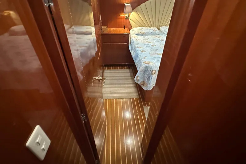  Yacht Photos Pics Luxurious cabin interior of 2006 Novatec Islander 55 yacht with wooden flooring.