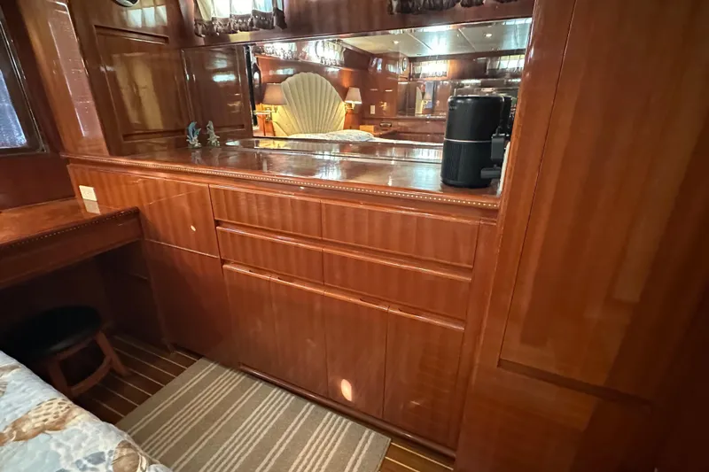  Yacht Photos Pics Luxurious wooden interior of 2006 Novatec Islander 55 yacht with mirror and cabinetry.