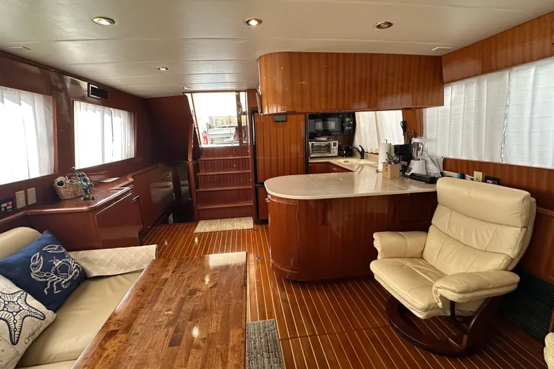  Yacht Photos Pics Luxurious interior of 2006 Novatec Islander 55 yacht with wood finishes and modern amenities.