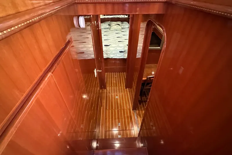  Yacht Photos Pics Luxurious wooden interior of 2006 Novatec Islander 55 yacht hallway.
