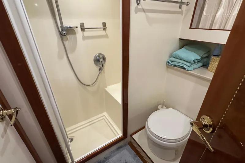  Yacht Photos Pics Bathroom interior of 2006 Novatec Islander 55 yacht with shower and toilet.