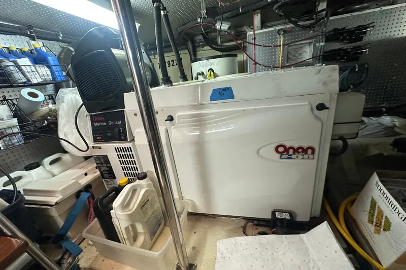  Yacht Photos Pics Engine room of 2006 Novatec Islander 55 with Onan marine generator.