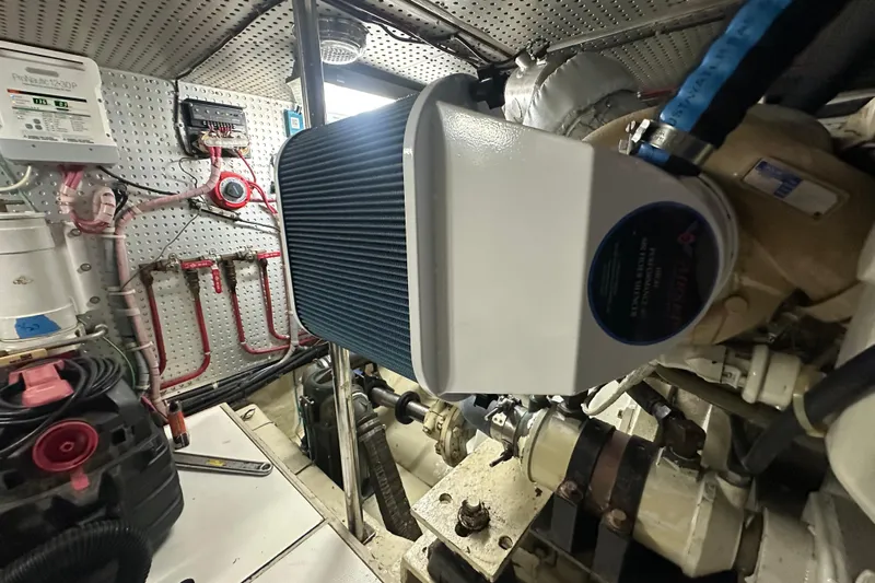  Yacht Photos Pics Engine room of 2006 Novatec Islander 55 yacht, featuring mechanical components and wiring.