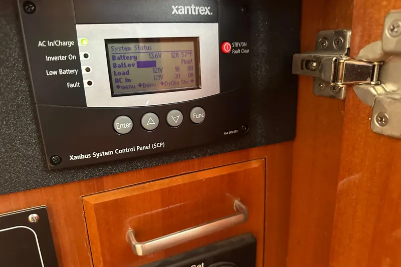  Yacht Photos Pics Xantrex control panel on 2006 Novatec Islander 55 yacht, displaying system status.