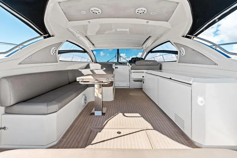  Yacht Photos Pics Luxurious interior of 2013 Azimut Atlantis 48 yacht with sleek seating and modern design.