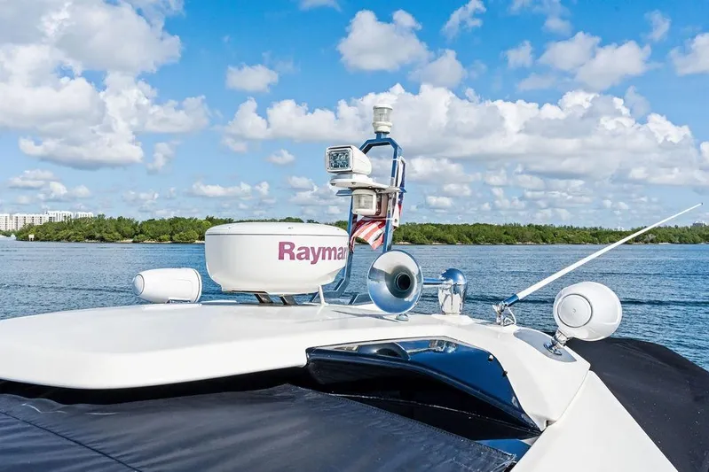  Yacht Photos Pics Azimut Atlantis 48 yacht, 2013 model, featuring radar equipment on a sunny day.