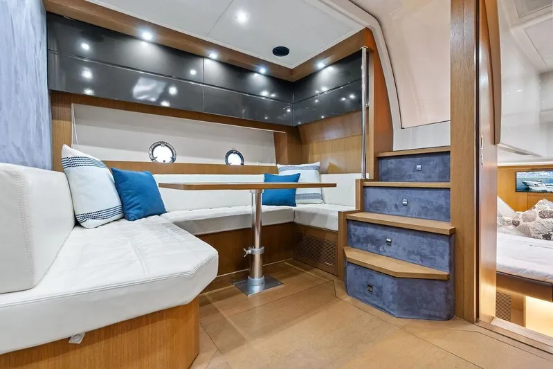  Yacht Photos Pics Luxurious interior of 2013 Azimut Atlantis 48 yacht with elegant seating and modern design.