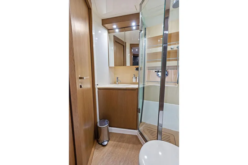  Yacht Photos Pics Luxurious bathroom interior of 2013 Azimut Atlantis 48 yacht with modern fixtures.