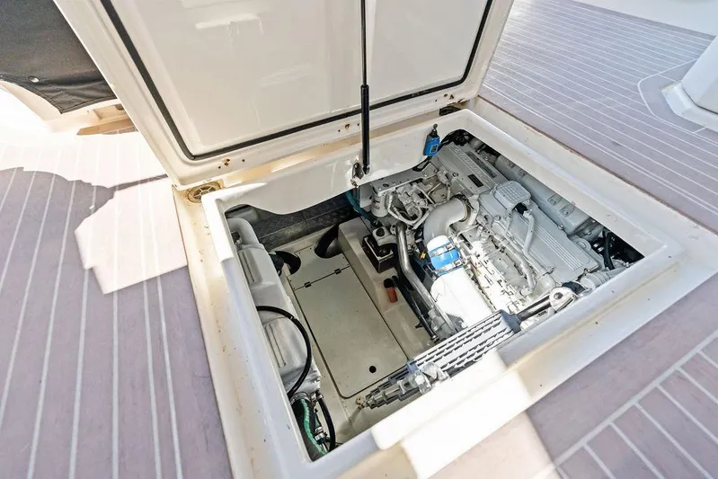  Yacht Photos Pics Engine compartment of 2013 Azimut Atlantis 48 yacht, showcasing detailed mechanical components.