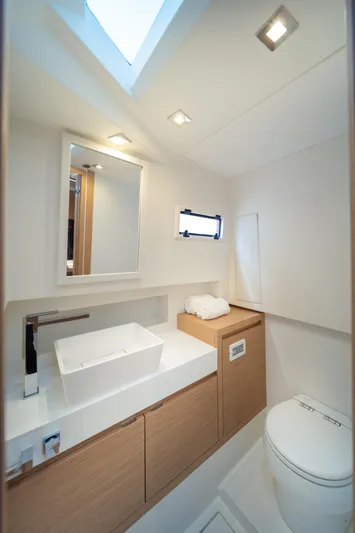 Freedom Yacht Photos Pics Modern bathroom in 2023 Pardo Yachts 38, featuring sleek fixtures and natural lighting.