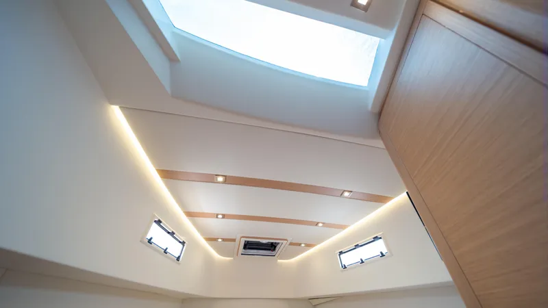 Freedom Yacht Photos Pics Interior view of 2023 Pardo Yachts 38, featuring modern ceiling design and skylight.
