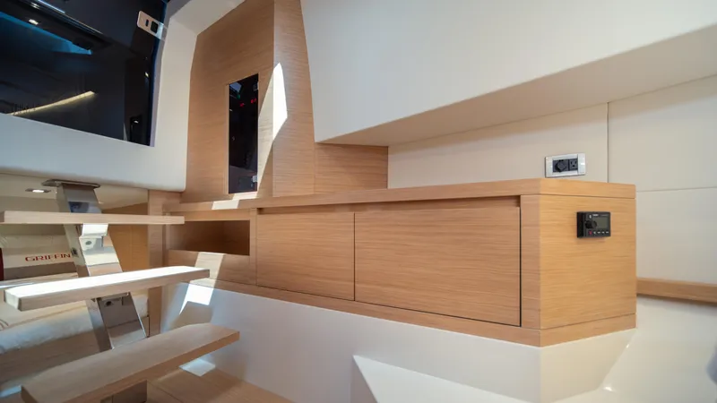 Freedom Yacht Photos Pics Interior of 2023 Pardo Yachts 38, featuring sleek wooden cabinetry and modern design elements.