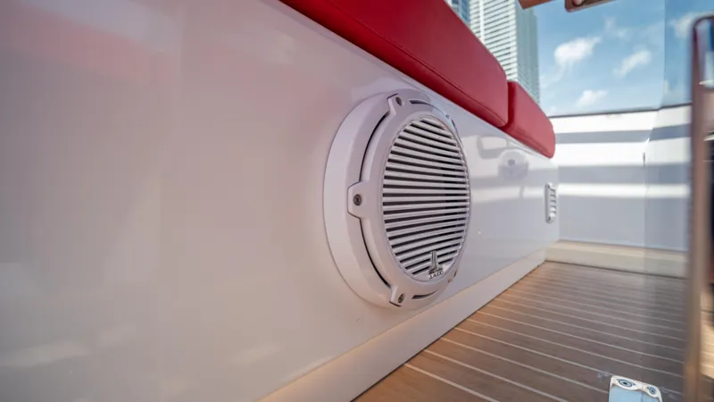 Freedom Yacht Photos Pics Speaker on 2023 Pardo Yachts 38, featuring red seating and wooden deck.