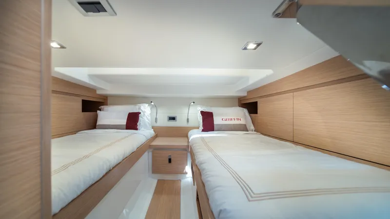 Freedom Yacht Photos Pics Interior of 2023 Pardo Yachts 38 featuring twin beds in a modern cabin.