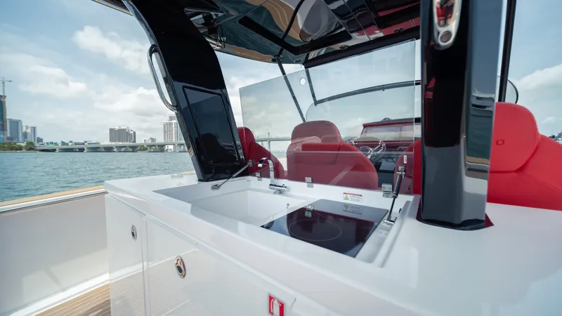 Freedom Yacht Photos Pics 2023 Pardo Yachts 38 with sleek design, featuring modern cockpit and luxurious red seating.