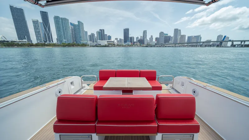 Freedom Yacht Photos Pics 2023 Pardo Yachts 38 with red seating, city skyline view.