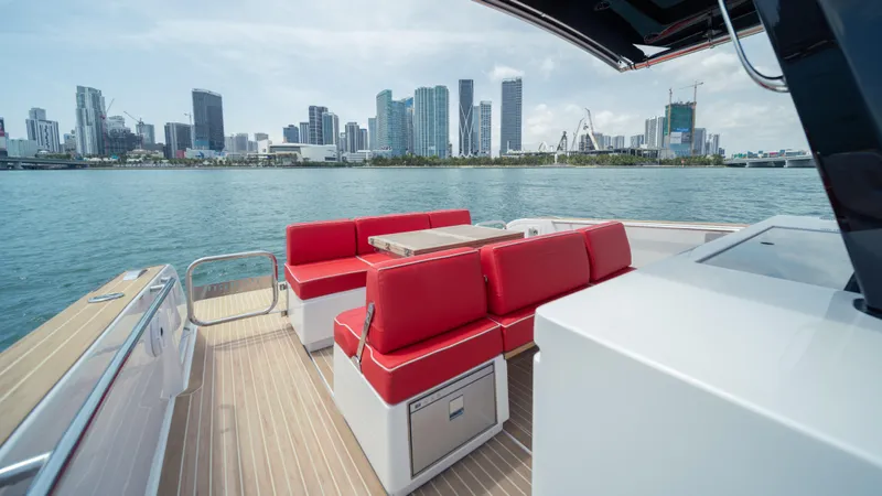 Freedom Yacht Photos Pics 2023 Pardo Yachts 38 with red seating, city skyline view.