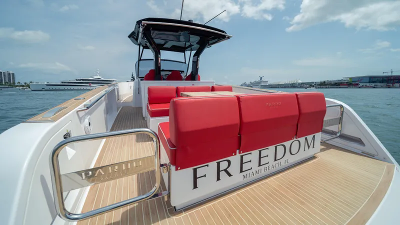 Freedom Yacht Photos Pics 2023 Pardo Yachts 38 with red seating, docked in Miami Beach.