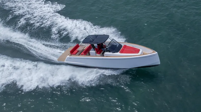 Freedom Yacht Photos Pics 2023 Pardo Yachts 38 cruising on water, featuring sleek design and red seating.