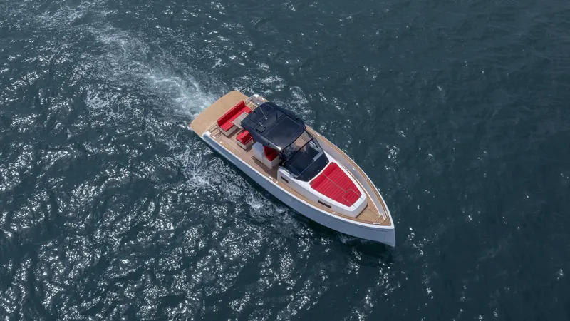 Freedom Yacht Photos Pics 2023 Pardo Yachts 38 cruising on open water, featuring sleek design and red accents.