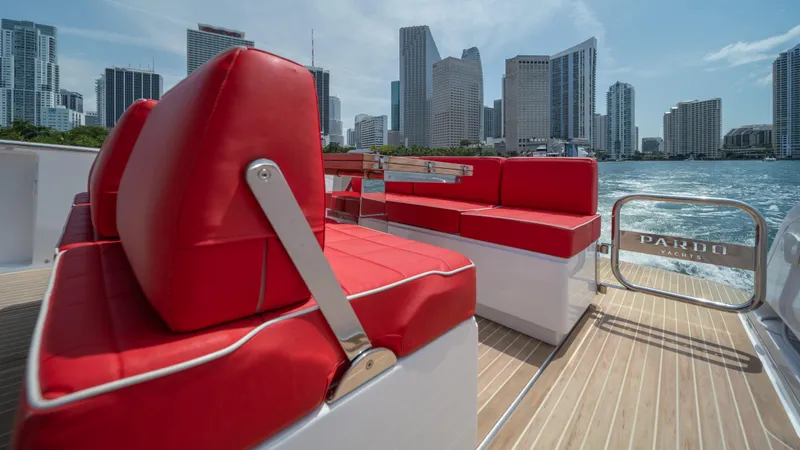 Freedom Yacht Photos Pics 2023 Pardo Yachts 38 with red seating, city skyline in background.