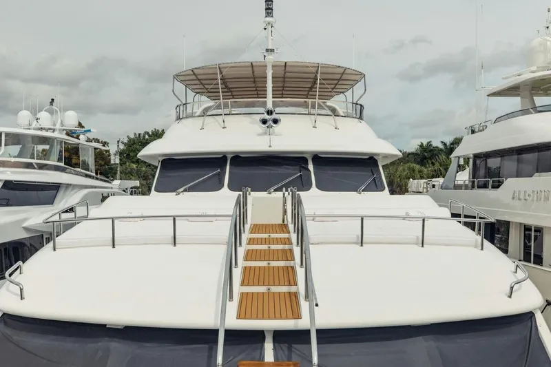 Mamma Mia Yacht Photos Pics Luxury 2007 Benetti 120 Classic yacht docked, showcasing sleek design and spacious deck.