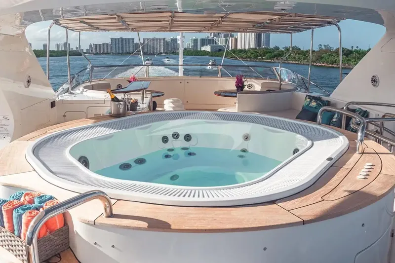 Mamma Mia Yacht Photos Pics Luxurious Benetti 120 Classic yacht with jacuzzi, 2007 model, overlooking scenic waterfront skyline.