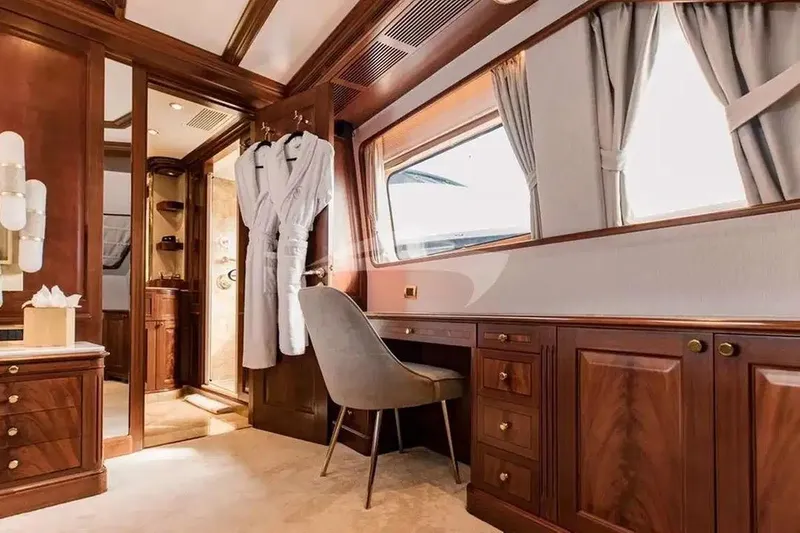 Mamma Mia Yacht Photos Pics Luxurious interior of 2007 Benetti 120 Classic yacht with elegant wood furnishings.